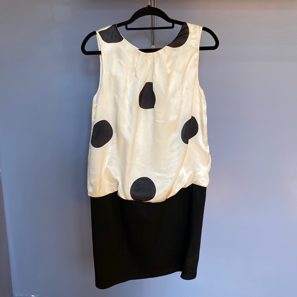 Dresigner dress, top part 100% silk.  Was wear once for wedding bought in Paris